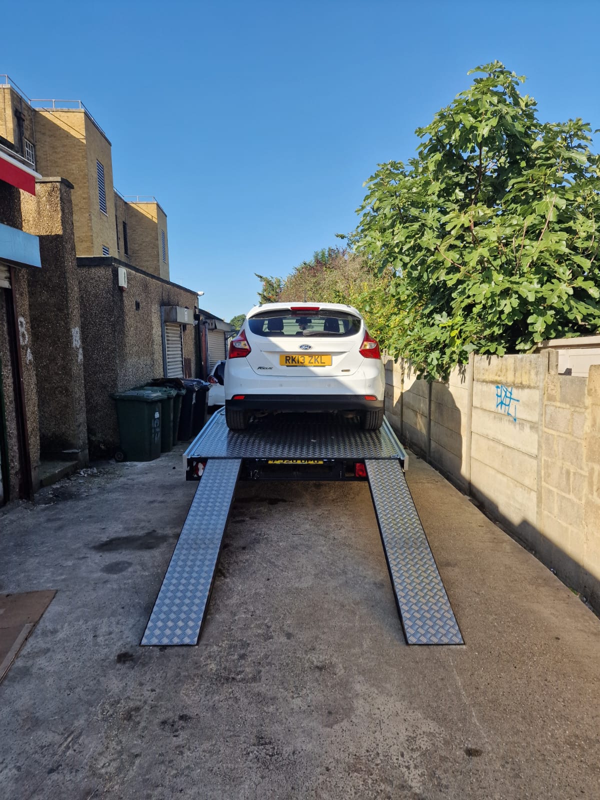 Car loaded onto recovery truck